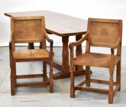 ROBERT 'MOUSEMAN' THOMPSON (1876-1955); an oak dining suite comprising hand adzed refectory table,