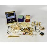 A quantity of vintage and contemporary costume jewellery to include white metal brooches, crucifix,