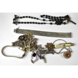 A quantity of silver and white metal jewellery to include link bracelets, floral brooch,
