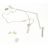 Two sterling silver necklace and earring suites (2).