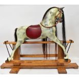 HADDON ROCKERS; a vintage rocking horse with grey dappled body and horse hair swish tail and mane,