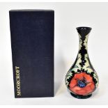 MOORCROFT; a boxed tubelined 'Poppy' pattern vase, 1996, impressed and painted marks to base,