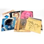 Over sixty LPs,12" singles and singles, to include Leonard Cohen,