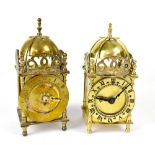 Two contemporary brass carriage clocks with domed bell tops,