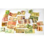 A small quantity of world banknotes and coins, to include a New Zealand $1 bill,