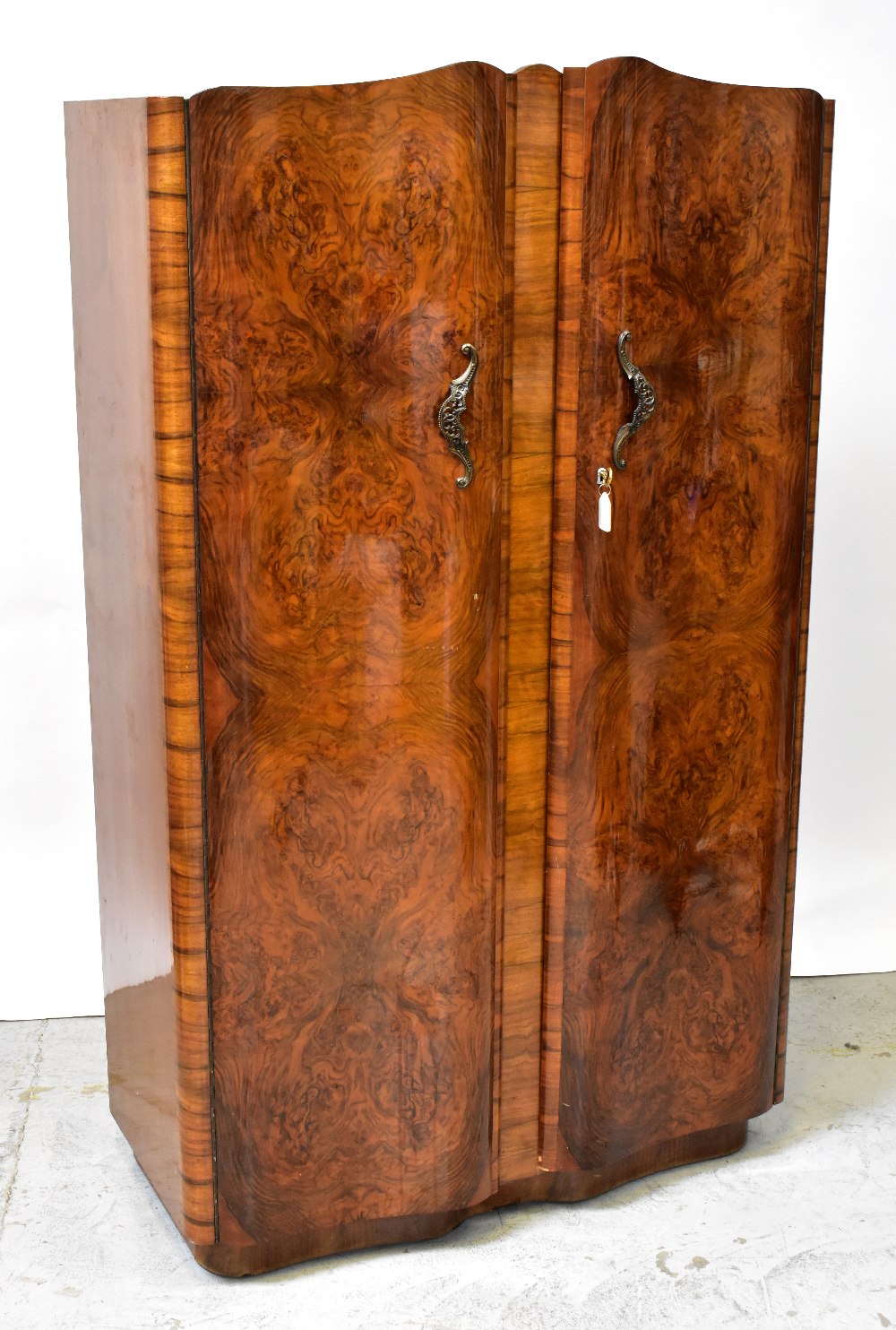 An early 20th century burr walnut bedroom suite comprising double wardrobe, double bedstead, - Image 9 of 16