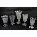 A collection of ten 19th century pressed and moulded glass celery vases of varying size,