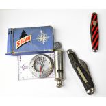 The Acme Scoutmaster whistle, two pocket knives, and a pocket compass (4).