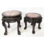 Two Chinese carved hardwood and marble inset low tables or stands,