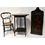 An early 19th century ebonised wall hanging corner cabinet in the Oriental style,