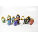 Six pairs of small cloisonné baluster vases of varying colourways and patterns, height 11cm,