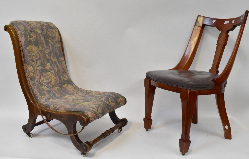 A set of four Victorian mahogany framed dining chairs with stuff-over seats,