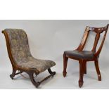 A set of four Victorian mahogany framed dining chairs with stuff-over seats,