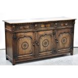 An early 20th century oak sideboard,