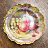 THOMAS LOCKYER FOR ROYAL WORCESTER; a hand painted cabinet plate depicting peaches,