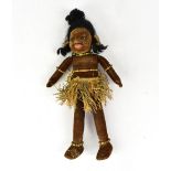 NORAH WELLINGS; a vintage South Seas Islander plush doll, with glass eyes and painted mouth,