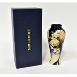 MOORCROFT; a baluster vase tubeline decorated in 'Royal Wedding' pattern,
