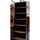 Three pieces of mid-century mahogany furniture comprising a tall slender bookcase, 175 x 48 x 25cm,