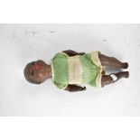 HEUBACH KOPPELSDORF; an early 1930s black baby doll with open-and-shut eyes, closed mouth,