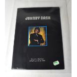 JOHNNY CASH; a 1988 tour programme bearing the star's signature and that of June Carter Cash.