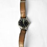 LONGINES; a WWII military wristwatch, the black dial set with Roman numerals,
