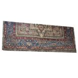 A large contemporary beige ground carpet with central medallion and floral surround,