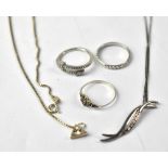 Three sterling silver rings and two sterling silver necklaces (5).