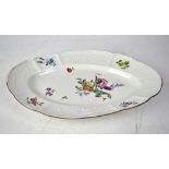 LUDWIGSBURG; an oval hand painted plate, decorated with Summer floral, tulips and roses, length 29.