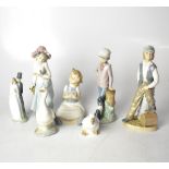 NAO; seven figures comprising four figures of children,