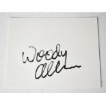 WOODY ALLEN; a card bearing his signature.