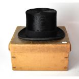 A black moleskin top hat by R Neill & Son Ltd, Great Charlotte Street, Liverpool,