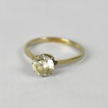 A 9ct gold solitaire dress ring set with white stone, stamped '9CT', size P, approx 2g.
