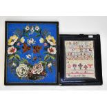 A 19th century beadwork study of a wreath of flowers, on a bright blue ground, 50 x 42cm,