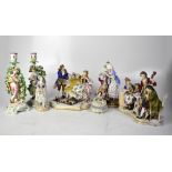 Seven 19th century Continental porcelain figural groups,