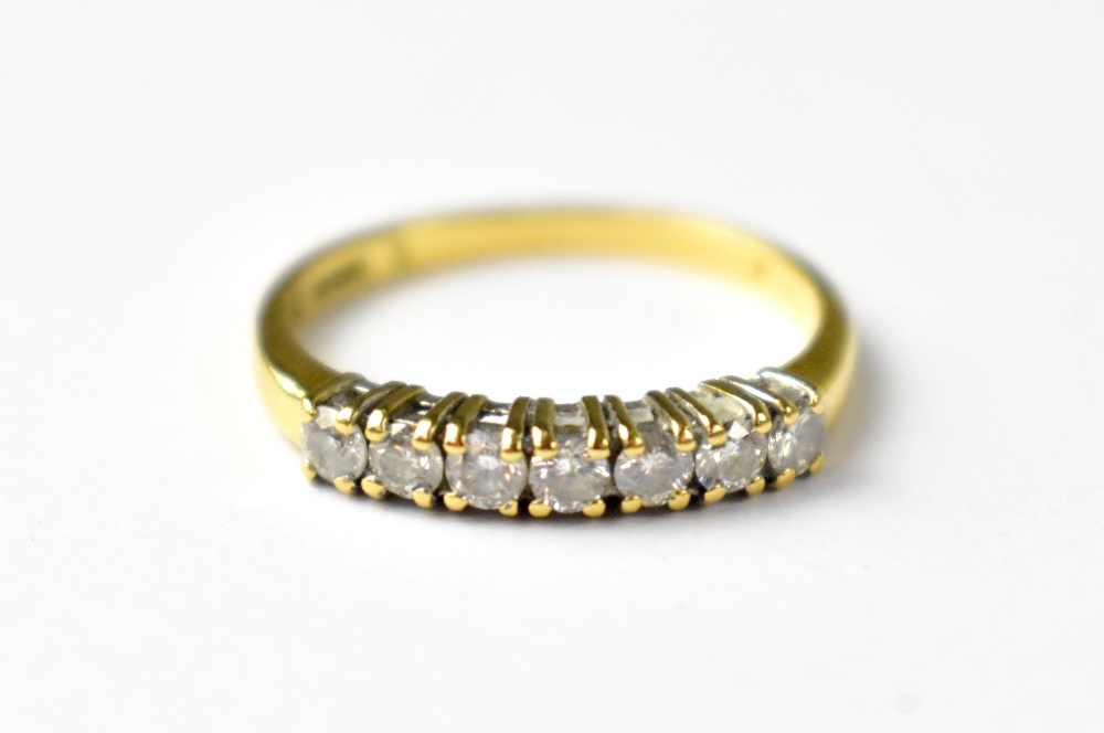 A 9ct gold half eternity ring with seven claw set diamonds, approx 0.5ct, size Q, approx 2.6g. - Image 2 of 3