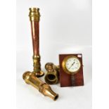 Four vintage brass and copper pieces of firefighting equipment to include a pressure line gauge