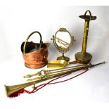 A quantity of brass and copper ware to include a swing dressing table mirror, various fire irons,