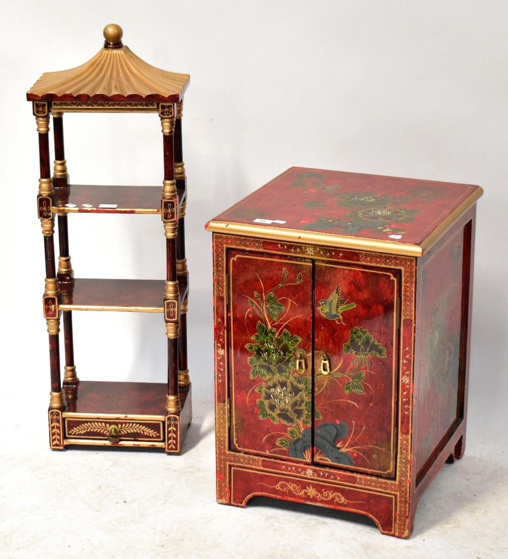 A Chinese lacquered cabinet painted with chrysanthemums and birds on a red ground,