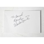 MARLON BRANDO; a card bearing the star's signature.