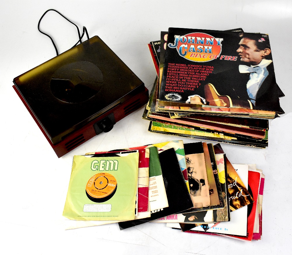 A turntable, together with a quantity of LP records, to include Jim Reeves, Johnny Cash,