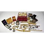 A quantity of costume jewellery and collectible items to include wristwatches, brooches,