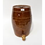 An early/mid-20th century brown stoneware Etherium drinking water container with tap, height 43cm.