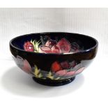 MOORCROFT; a cobalt blue ground bowl with Anemone pattern, initialled to base, ANJI, no.