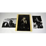 JAMES BROWN; three black and white photographs, each bearing the star's signature (3).