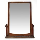 An Edwardian mahogany framed swing dressing chest mirror converted to a wall-hanging mirror,