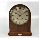 A George V mahogany arched-top mantel clock with boxwood stringing,