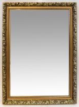 A gilt framed rectangular wall mirror with bevelled glass plate,