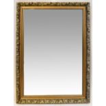A gilt framed rectangular wall mirror with bevelled glass plate,