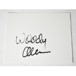 WOODY ALLEN; a card bearing his signature.