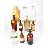 PHARMACEUTICAL INTEREST; a quantity of early 20th century pharmaceutical bottles and storage jars,